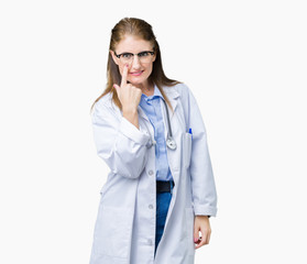 Middle age mature doctor woman wearing medical coat over isolated background Pointing to the eye watching you gesture, suspicious expression
