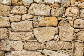 Old grunge stone background. Horizontal color photography.