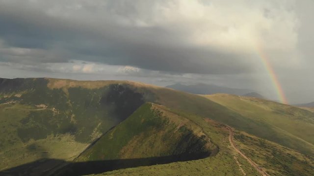 Rainbow over Carpathian ridge Swidovets. Mount Kotel, Great Cauldron , 1771 m