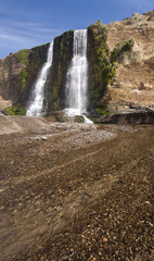 Large waterfall flowing onto beach and into ocean: Alamere Falls, Point Reyes, California
