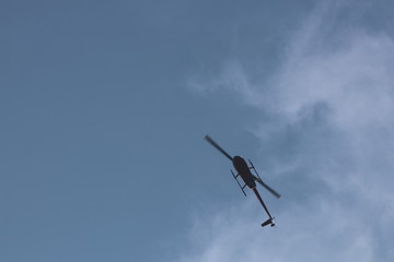 Fototapeta na wymiar helicopter in the sky
