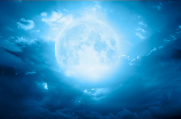 Naklejka na ściany i meble Night sky with moon in the clouds 