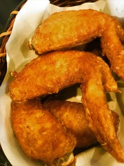 Fried chicken wings on dish