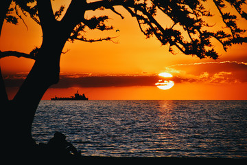 In the calm of a sunset.