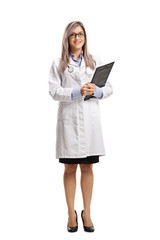 Young female doctor holding a clipboard