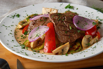 Homemade Slow Cooker Pot Roast with with mushrooms and vegetables