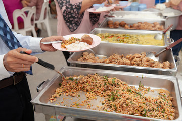 Food Buffet Catering Dining Eating Party Sharing Concept.people group catering buffet food indoor in luxury restaurant with meat colorful fruits and vegetables