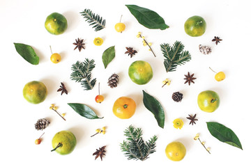 Christmas styled composition. Tangerine citrus fruit and leaves, fir tree branches, anise stars,...