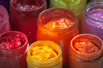 orange color of screen printing ink for print on tee shirts and fabric. .plastisol ink useful in tee shirt factory and t