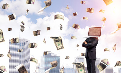 Businessman with laptop instead of head.
