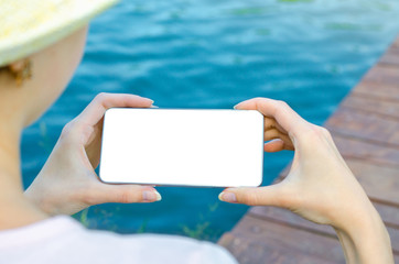 Close Up Business Woman in hat Using Smartphone Mobile Phone Outdoor Black Oled Display Wooden Background Stylish Summer Dressed hipster