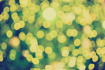 Bokeh from lighting of green christmas tree