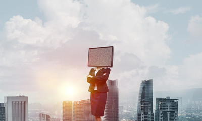 Business woman with TV instead of head.