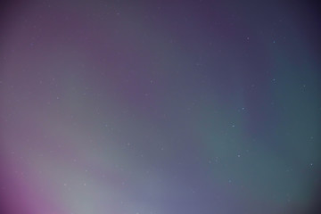 Obraz premium abstract bright background blue green purple northern lights stars&nbsp;