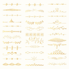 Vintage hand drawn golden dividers, lines, gold calligraphic borders and ornate laurels set. Vector isolated elements. 