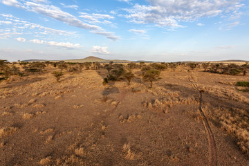 shadow of ballon above serengeti desert tanzania