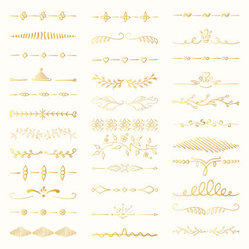 Vintage hand drawn golden dividers, lines, gold calligraphic borders and ornate laurels set. Vector isolated elements. 