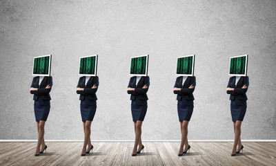 Business women with monitors instead of head.