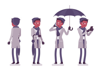 Stylish young black man with umbrella standing