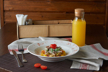 Potato salad with green vegetable on plate