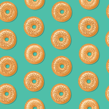 Seamless pattern with top view of fresh bagels, white and brown sesame seeds on top. Delicious breakfast. Vector seamless pattern.