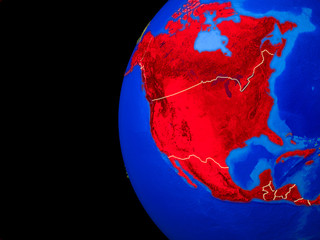 North America from space on realistic model of planet Earth with country borders and detailed planet surface.