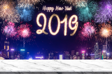 Happy new year 2019 fireworks over cityscape at night with empty white marlbe table,Banner mock up template for display or montage of product for holiday promotion advertising