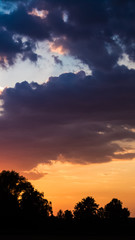 Fototapeta na wymiar Smartphone HD wallpaper of beautiful sunset near Plattling - Isar - Bavaria - Germany