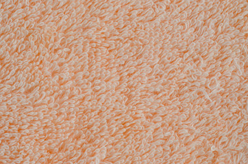 Texture of beige terry cloth closeup shot