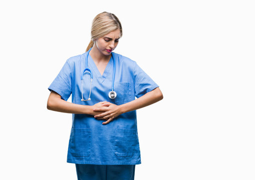 Young Beautiful Blonde Doctor Surgeon Nurse Woman Over Isolated Background With Hand On Stomach Because Indigestion, Painful Illness Feeling Unwell. Ache Concept.