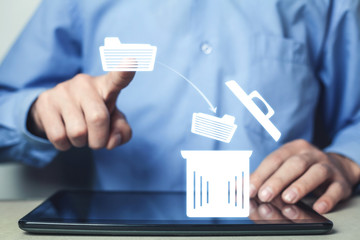 Man hand touching on file. Deleting files