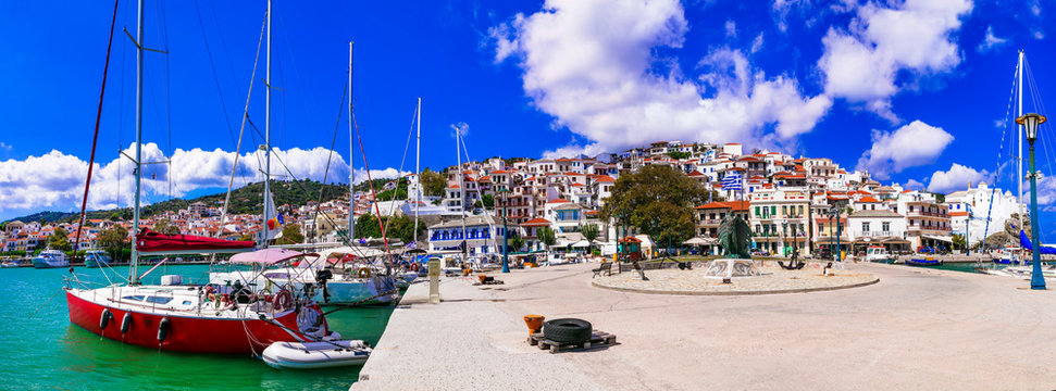 Fototapeta Skopekos island- popular tourist summer destination in Greece. Old port