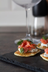 pancake with cream and fish, snacks.