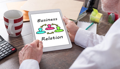 Business relation concept on a tablet