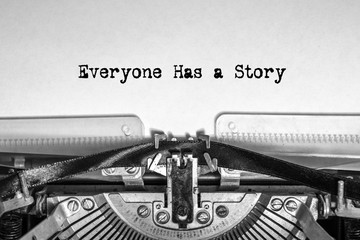 Everyone Has a Story printed on a sheet of paper on a vintage typewriter. journalist, writer