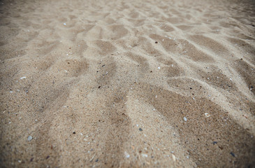 Fine beach sand in the summer sun
