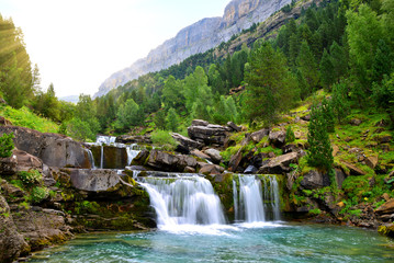 Waterfall in Ordesa and Monte Perdido National Park. Pyrenees mountain. Province of Huesca, Spain.