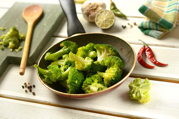 stir-fried broccoli with ingredients around