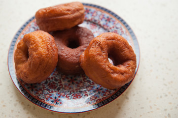 Fried doughnut on the plate