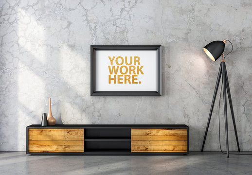 Black Wooden Framed Print Hanging on Concrete Wall Mockup