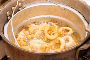 calamari ring  squid on a frying pan