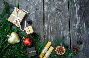 Christmas gift boxes on a rustic wooden background
