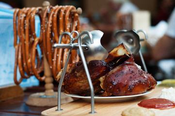 Traditional national dish 'Pig knee' ('vepřové koleno'). Shooting in daylight, shallow depth of field (selective sharpness), blurred background.