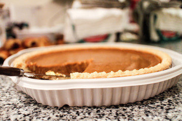 pumpkin pie on kitchen counter