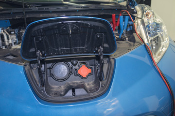 Obraz premium Electric car stands on the service close-up. Transport