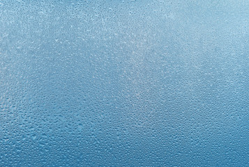 Misted glass background. Strong humidity in wintertime.