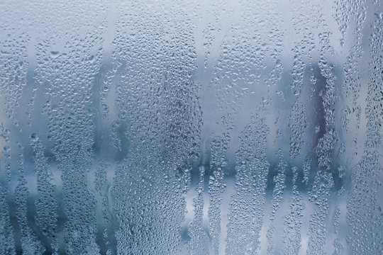 texture of a misted glass with a lot of drops and condensation flows