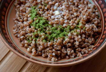 buckwheat porridge in bowl (closeup)