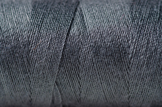 Black gray thread macro background clothing sewing material