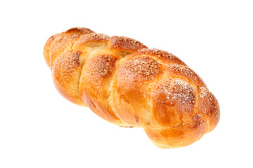 Traditional Bulgarian sweet leavened bread Kozunak, braided and sprinkled with sugar, isolated on...